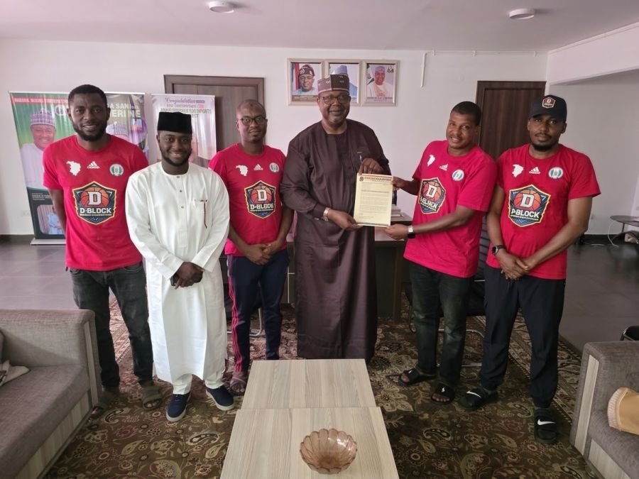 Hon. Ben Kure receives D-Block Basketball Academy management on a courtesy visit
